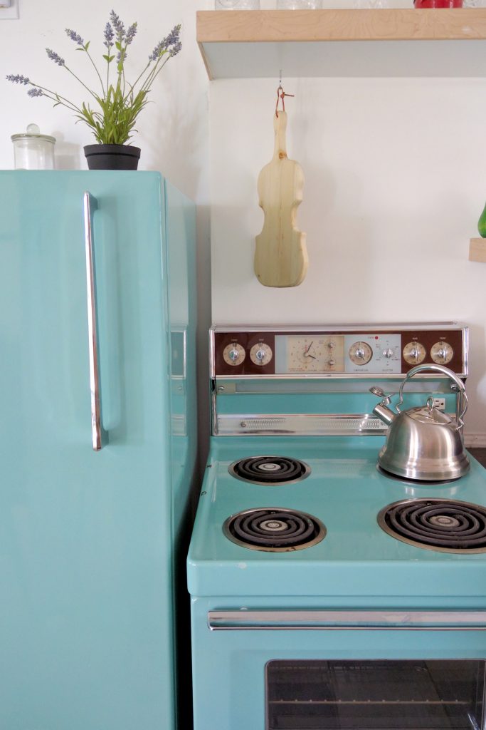 50s teal appliances and a fiddle cutting board in Saskatoon