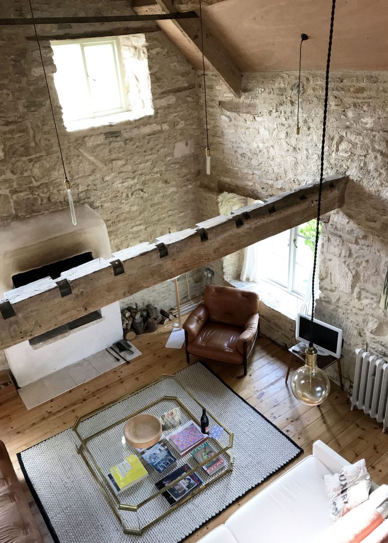 topdown view of a living room with exposed beams