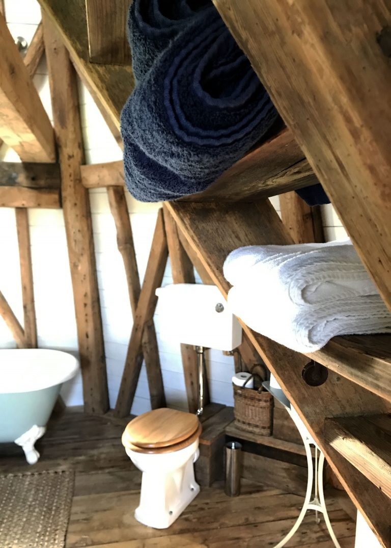 towels stacked on old ladder
