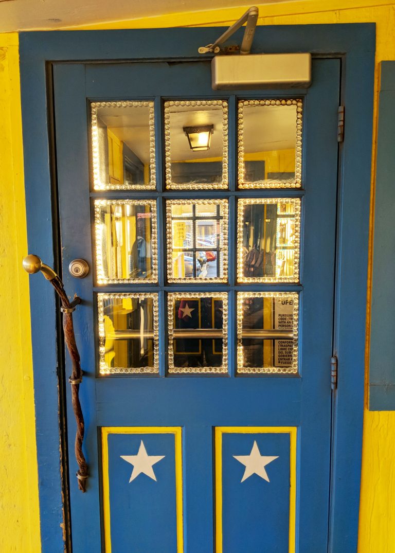 Blue and yellow door at the Big Texan restaurant