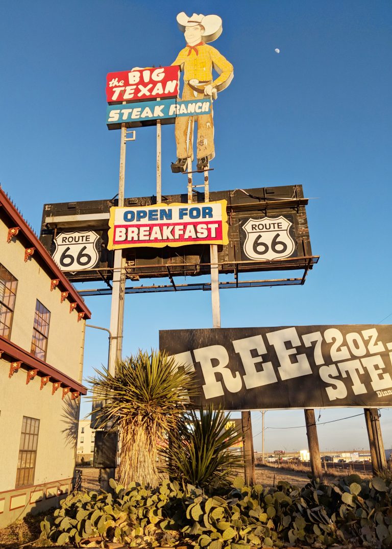 Sign outside the Big Texan restaurant advertising a free 72 oz steak