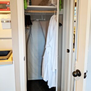 open closet with bathrobes