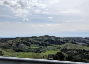 hills overlooking ocean on California Highway 1