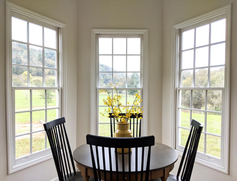 Three windows in dining room at Oak and Hare Farms Be Our Guest Throw Pillow in Tennessee Airbnb